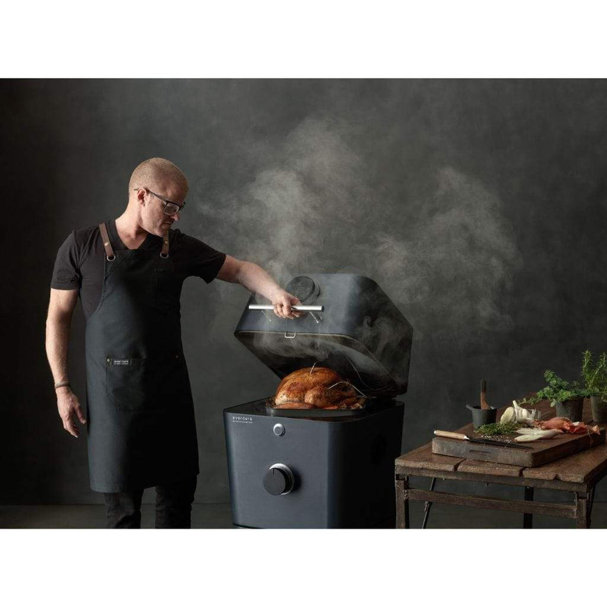 Everdure 4K electric ignition charcoal grill and outdoor oven on its stand – view 11