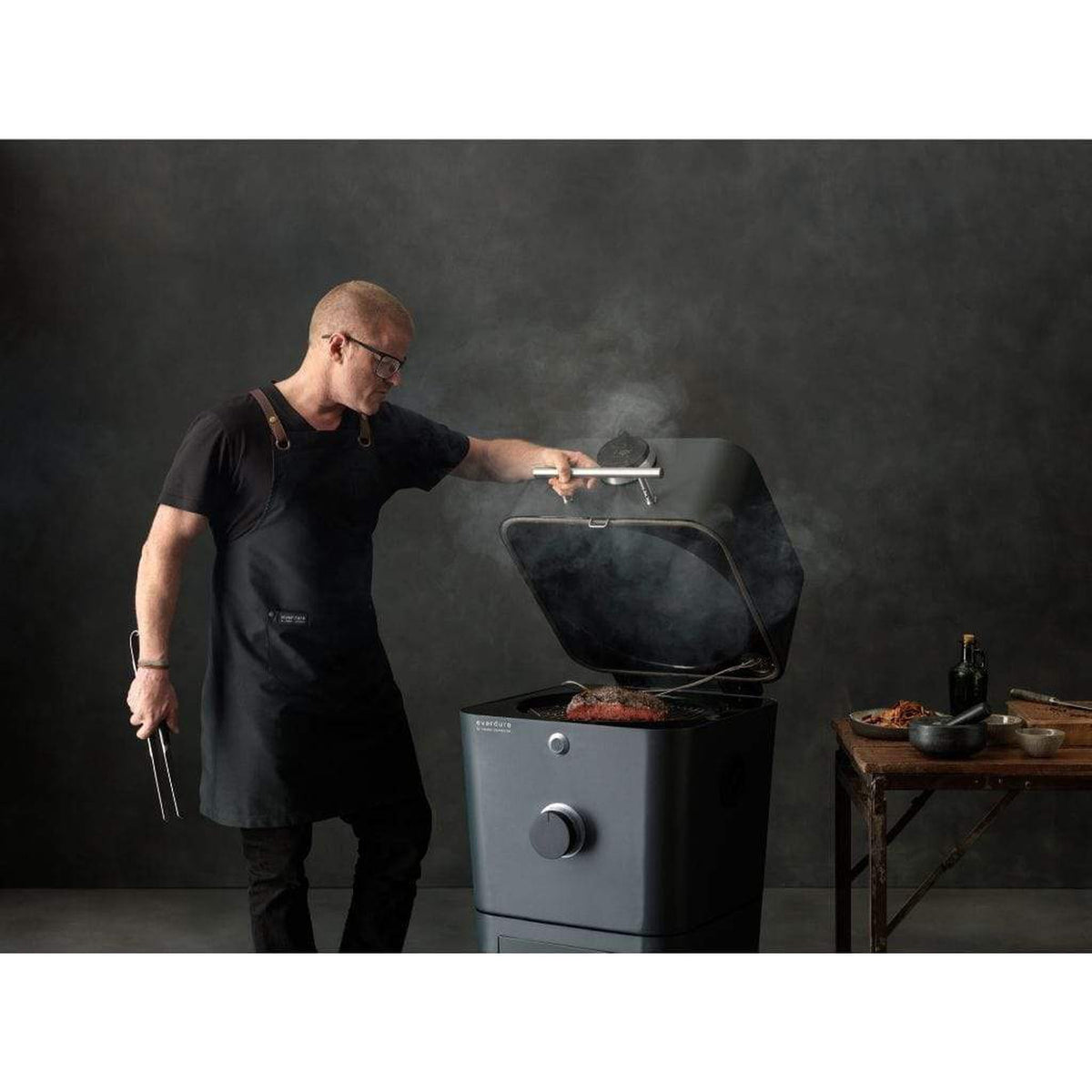 Everdure 4K electric ignition charcoal grill and outdoor oven on its stand – view 12