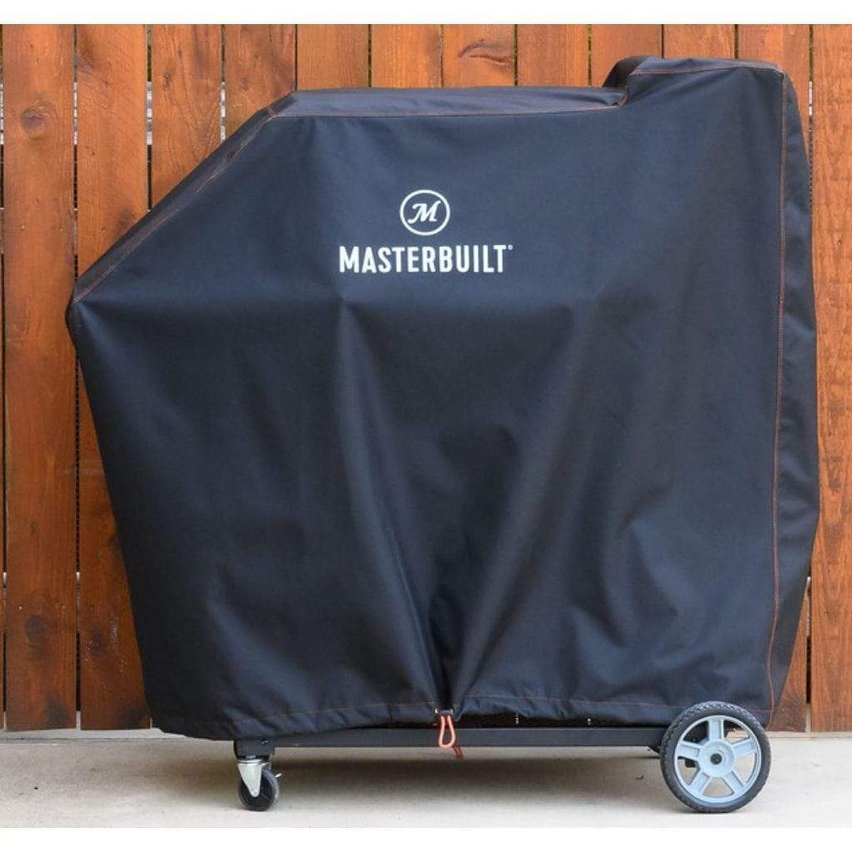 Black Masterbuilt cover fitted over a Gravity Series 560 grill – view 2