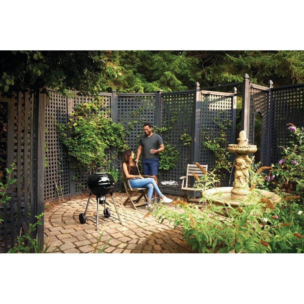 Black Napoleon 18 inch charcoal kettle grill on four-leg stand – view 5