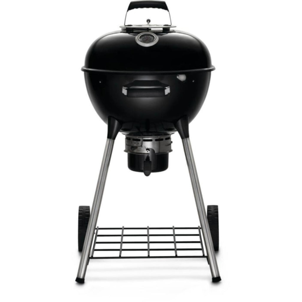 Black Napoleon 18 inch charcoal kettle grill on four-leg stand